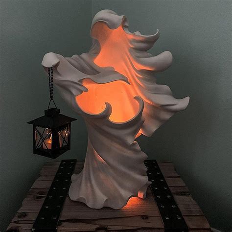 Craxker barrel hallpwewn witch with lantern
